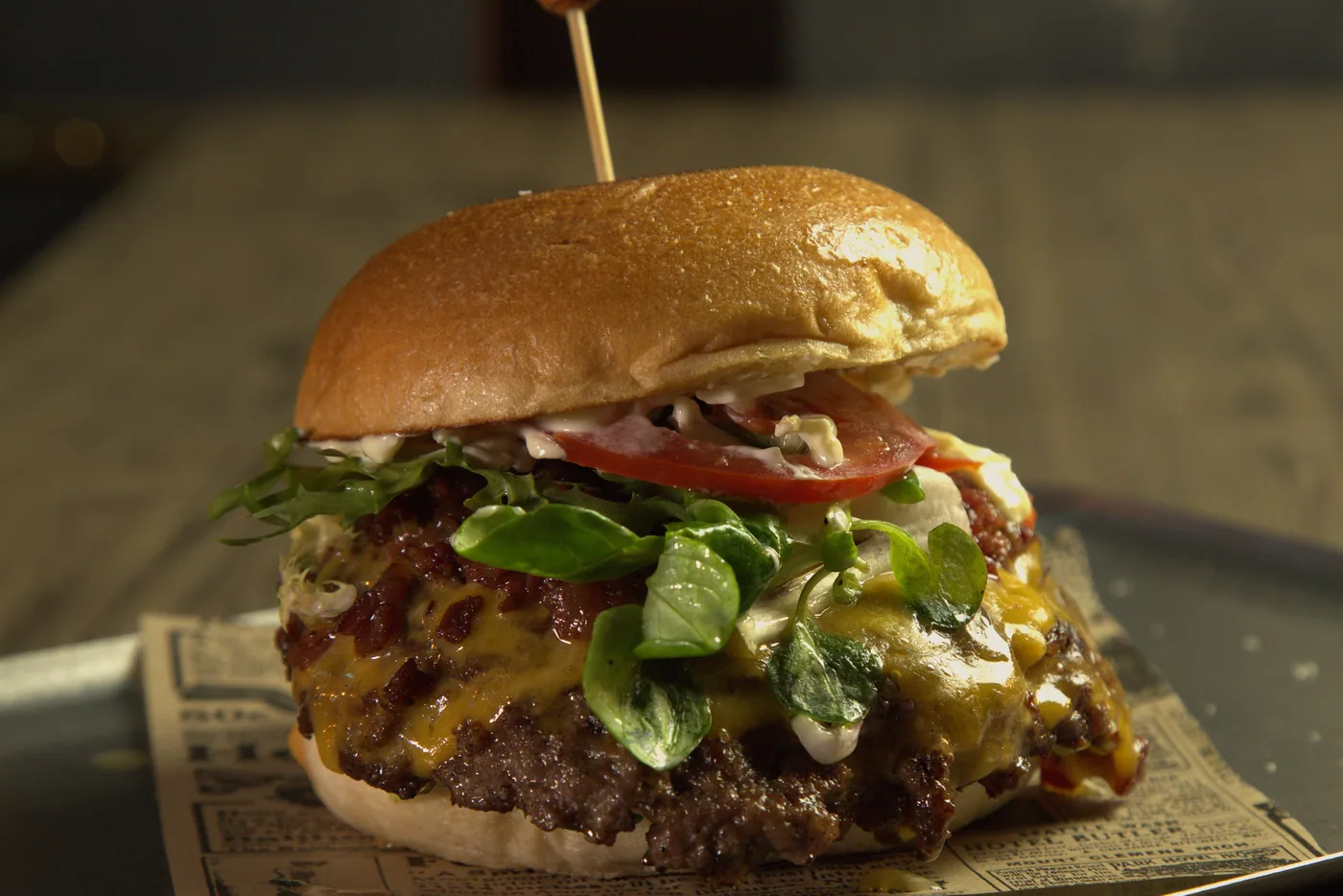 Cargol — Double smash, crispy bacon, cheddar, chili sauce, mayo, lettuce, tomato, pickles