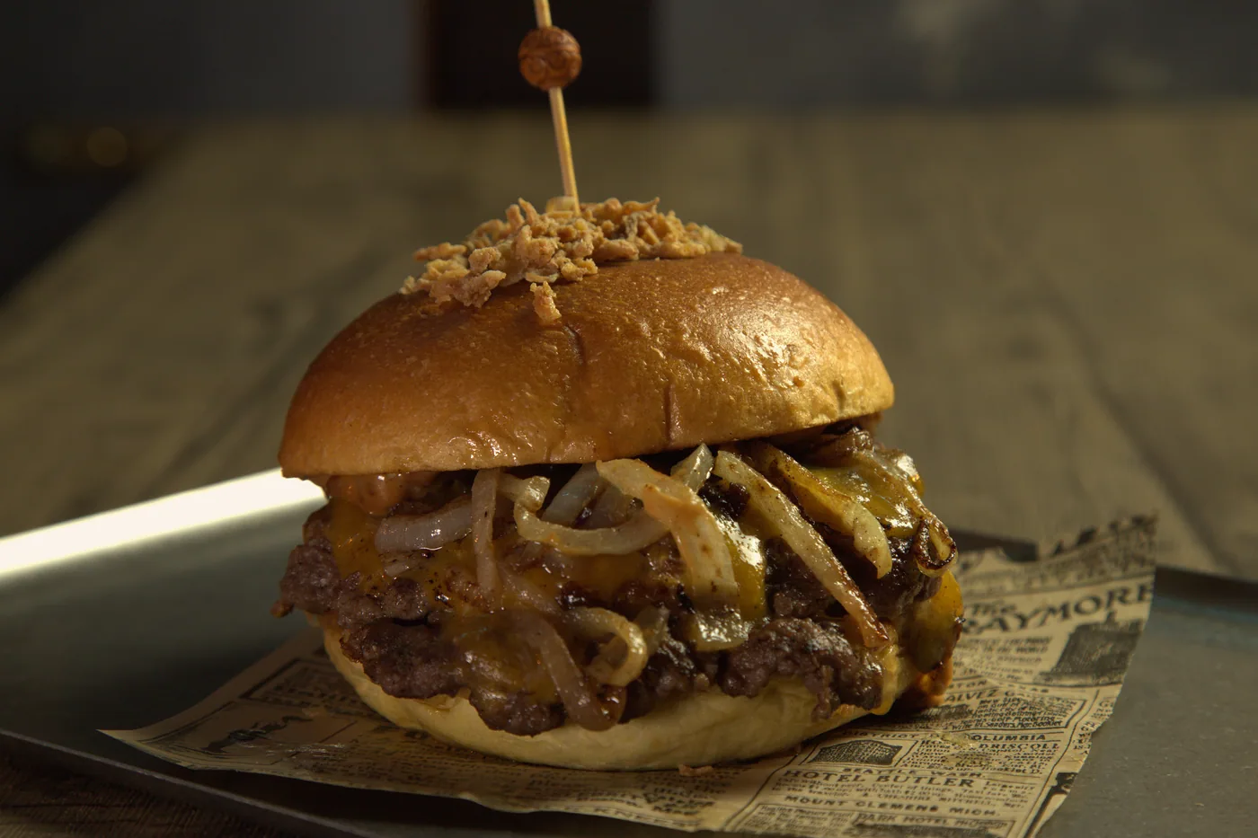 Perris — Double smash, house sauce, cheddar, crispy bacon, fried onions