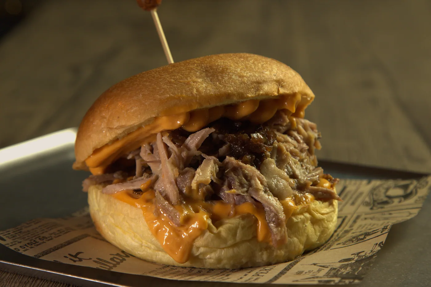 Taverna — Smash, pulled pork, cheddar, caramelized onion, burger sauce