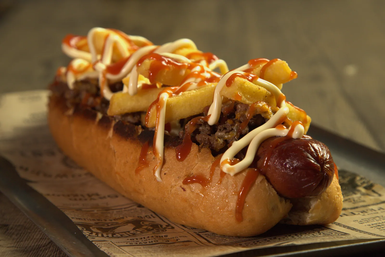 Hot Dog XXL — Frankfurt, ground beef, bacon, 4-cheese blend, fries, cheddar, mayo, ketchup